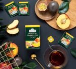 ahmad tea flavored black tea peach & passion fruit image