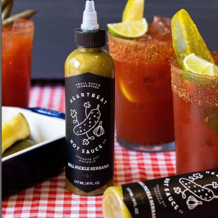hearbeat dill pickle serrano hot sauce bottle image