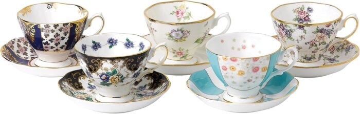 100 years teacup & saucer 5 piece set 1900 1940 image