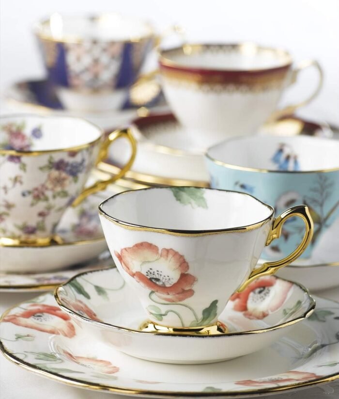 100 years teacup & saucer 5 piece set 1900 1940 image