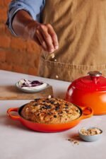 le creuset enameled cast iron bread oven flame image