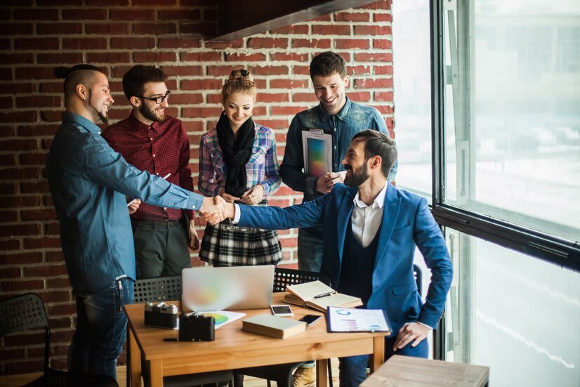 business-team-manager-with-handshake-greeted-customer_160672-606
