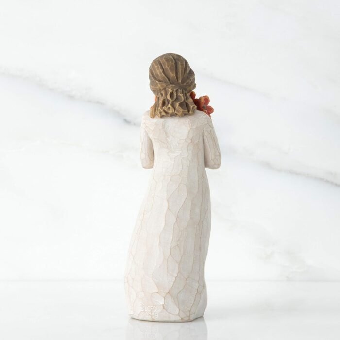 willow tree surrounded by love figurine
