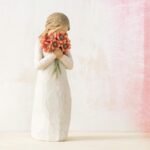 willow tree surrounded by love figurine