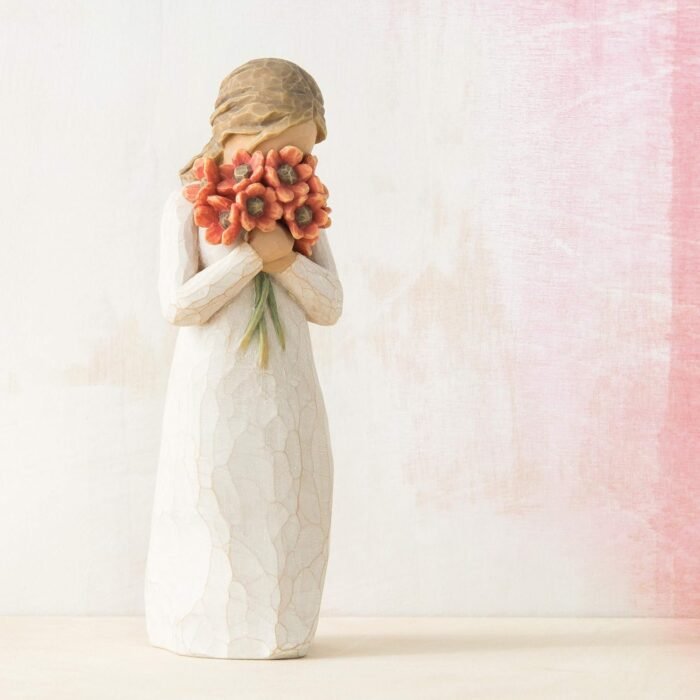 willow tree surrounded by love figurine